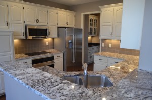 Kitchen Cabinets refaced, replaced or repainted by Artisan Construction, 7321 N Antioch Gladstone, MO  64119