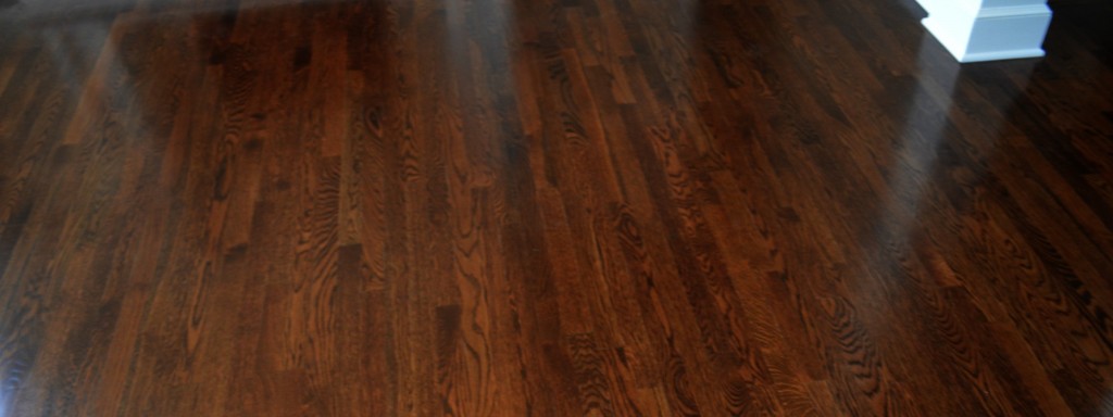 Dark Hardwood Floors by Artisan Construction, 7321 N Antioch Gladstone, MO  64119