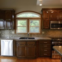 Remodeled kitchen cabinets by Artisan Construction, 7321 N Antioch Gladstone, MO 64119