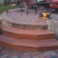 Custom built patio with stone work and wood work by Artisan Construction, 7321 N Antioch Gladstone, MO  64119