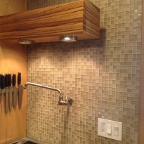 Kitchen tiled backsplash with kitchen faucet by Artisan Construction, 7321 N Antioch Gladstone, MO 64119