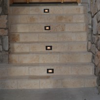 Outdoor lighting in steps by Artisan Construction, 7321 N Antioch Gladstone, MO  64119