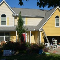 <img scr=”house-painting-before-500” alt=”A home’s exterior before we painted it, Kansas City, Artisan Construction”>