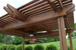 <img scr=”pergola-backyard.JPG.” alt=”Pergola beams, Kansas City, Artisan Construction”>